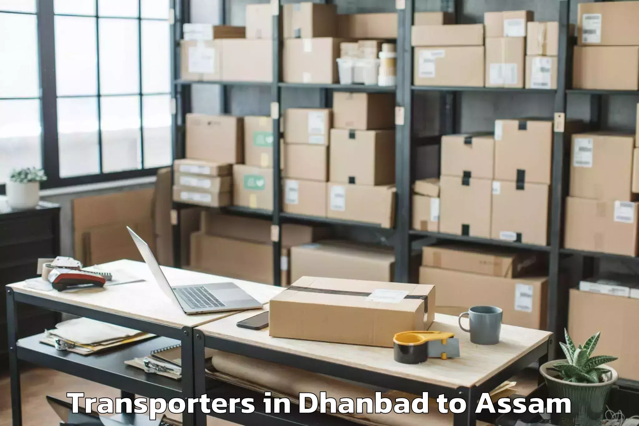 Leading Dhanbad to Kalaigaon Transporters Provider